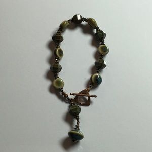 Copper tone Bracelet with green beads
